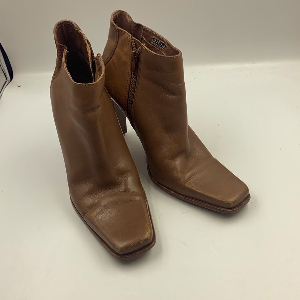 Leather high heel booties.